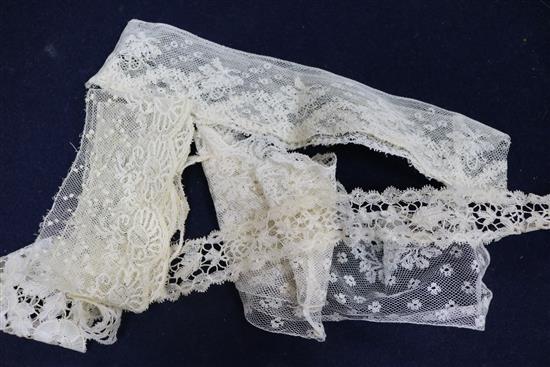 An early 18th century lace collar together with mixed needle and bobbin 19th century laces